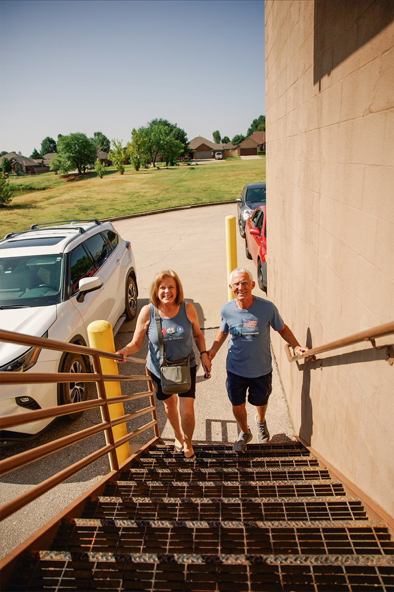 volunteers walking into the YMM facility
